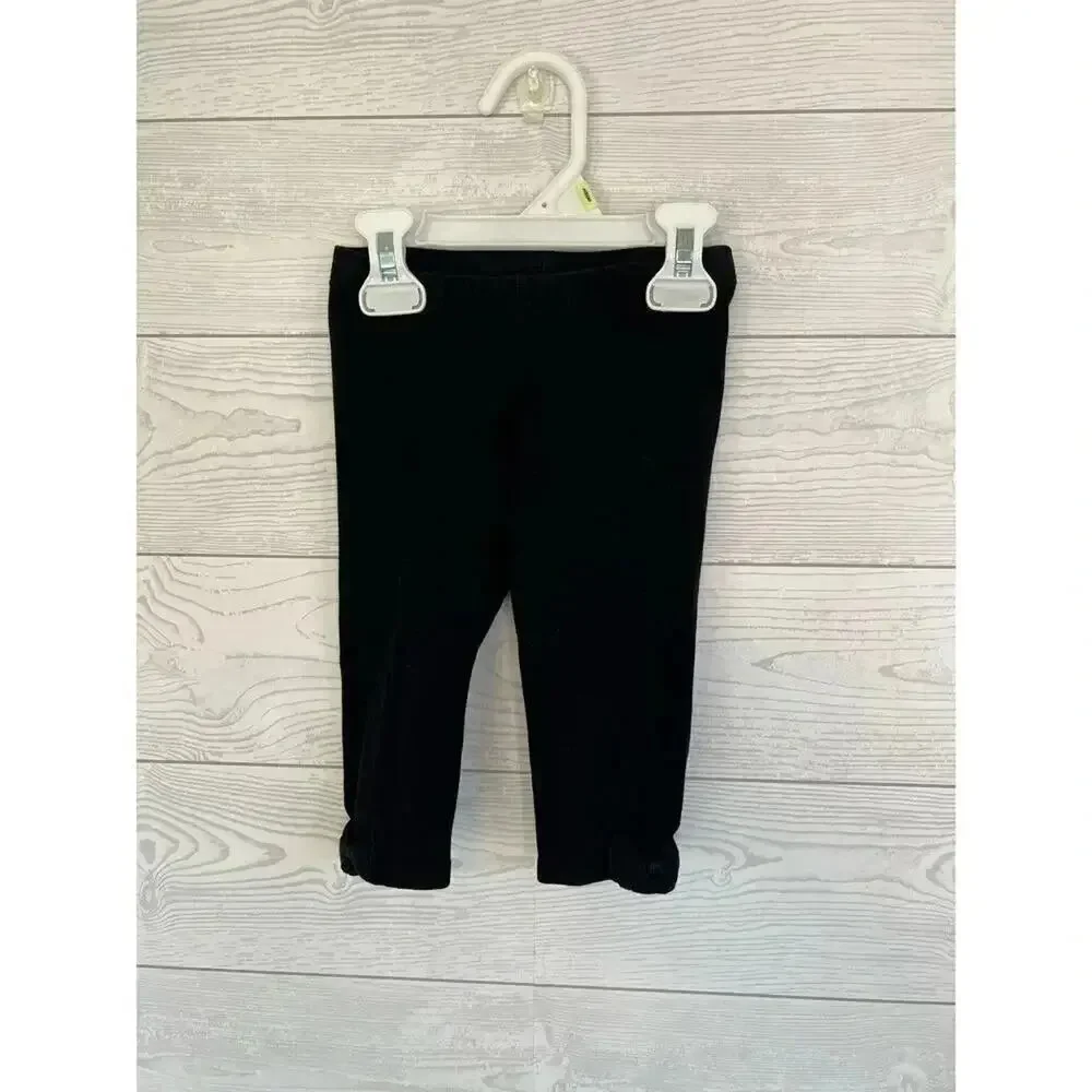 Jumping Beans long sleeve black & white floral top/black capris Size 2T